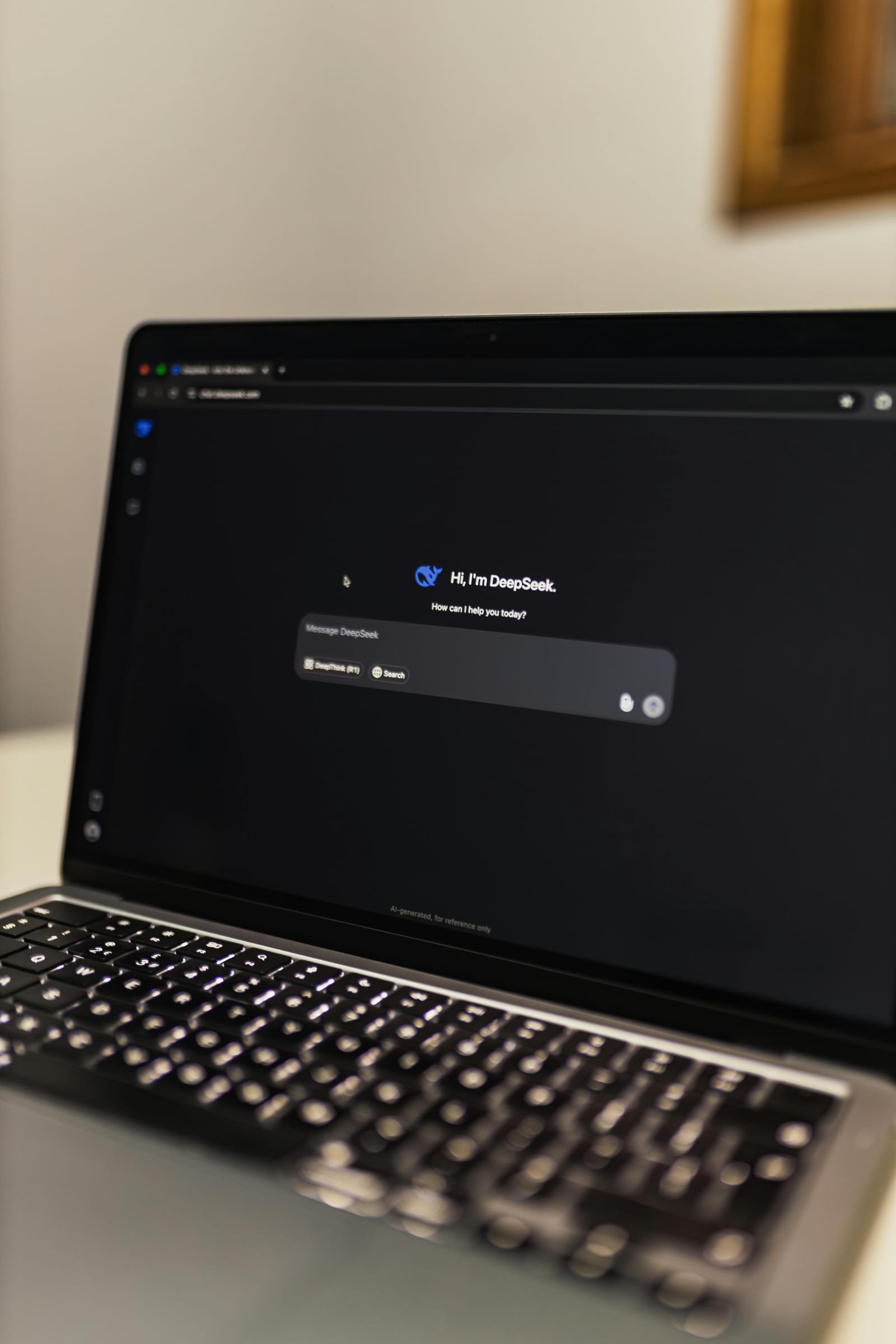 Laptop displaying an AI chat interface on screen
