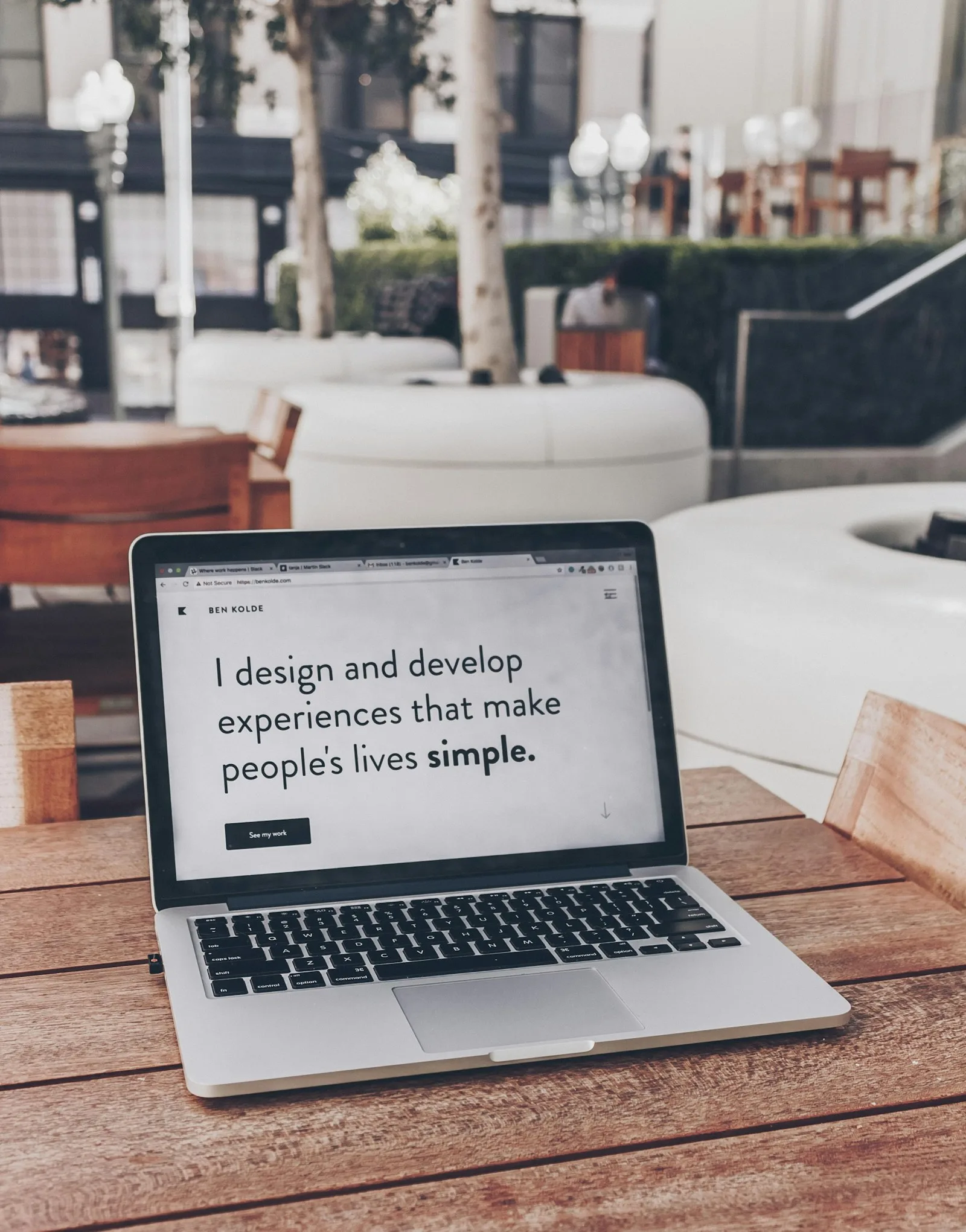 Laptop showing a web design portfolio